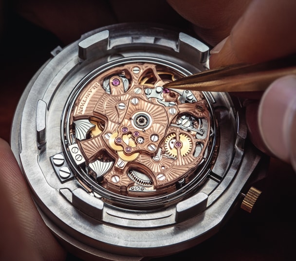 A carrousel minute repeater movement placed into a custom-designed holder.
