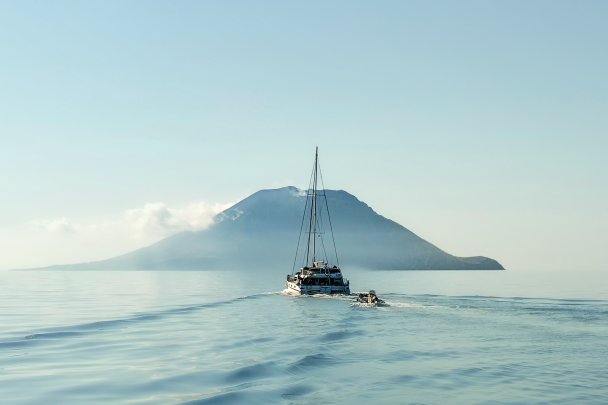 The&nbsp;Victoria&nbsp;on its way to Stromboli, the most active volcano in the Aeolian Islands that erupts regularly. Men and women live on its flanks, under the permanent threat of a lava flow, a fiery cloud or a tsunami.

