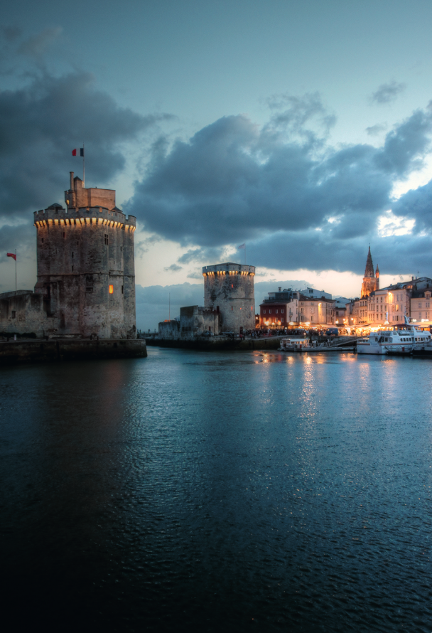 The fortresses guarding the entrance to the La Rochelle harbor.
