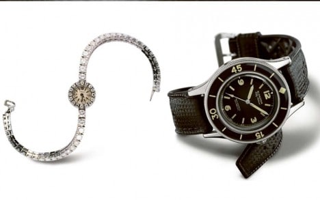 Ladybird贵妇鸟腕表众多珠 宝表款中的一款，以及一枚Fifty Fathoms 五十噚腕表。
