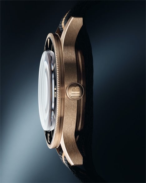 The hues of the bronze-gold Act 3 case and its brushed finish recall the distinguished finish of the vintage pieces.